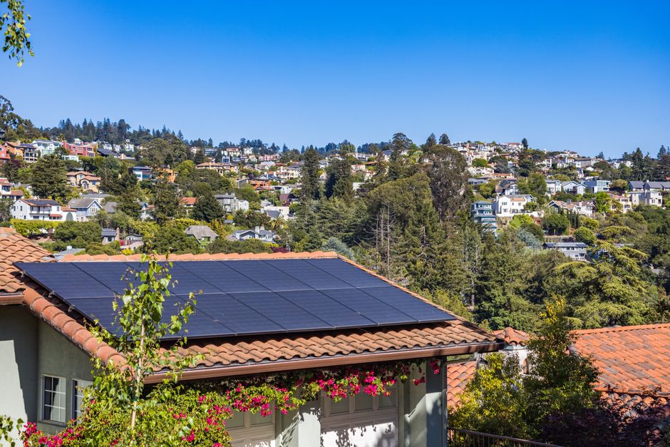 House roof fitted with modern solar panels